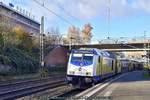 dieselloks/592477/me-246-002-schiebt-re5-richtung ME 246 002 schiebt RE5 Richtung Cuxhaven am 17.11.2017 in Hamburg-Harburg